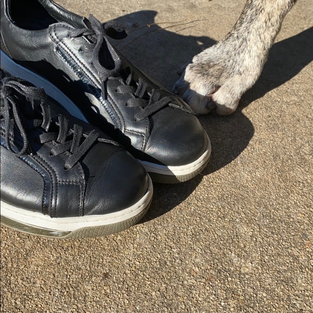 Prada men’s black leather sneakers